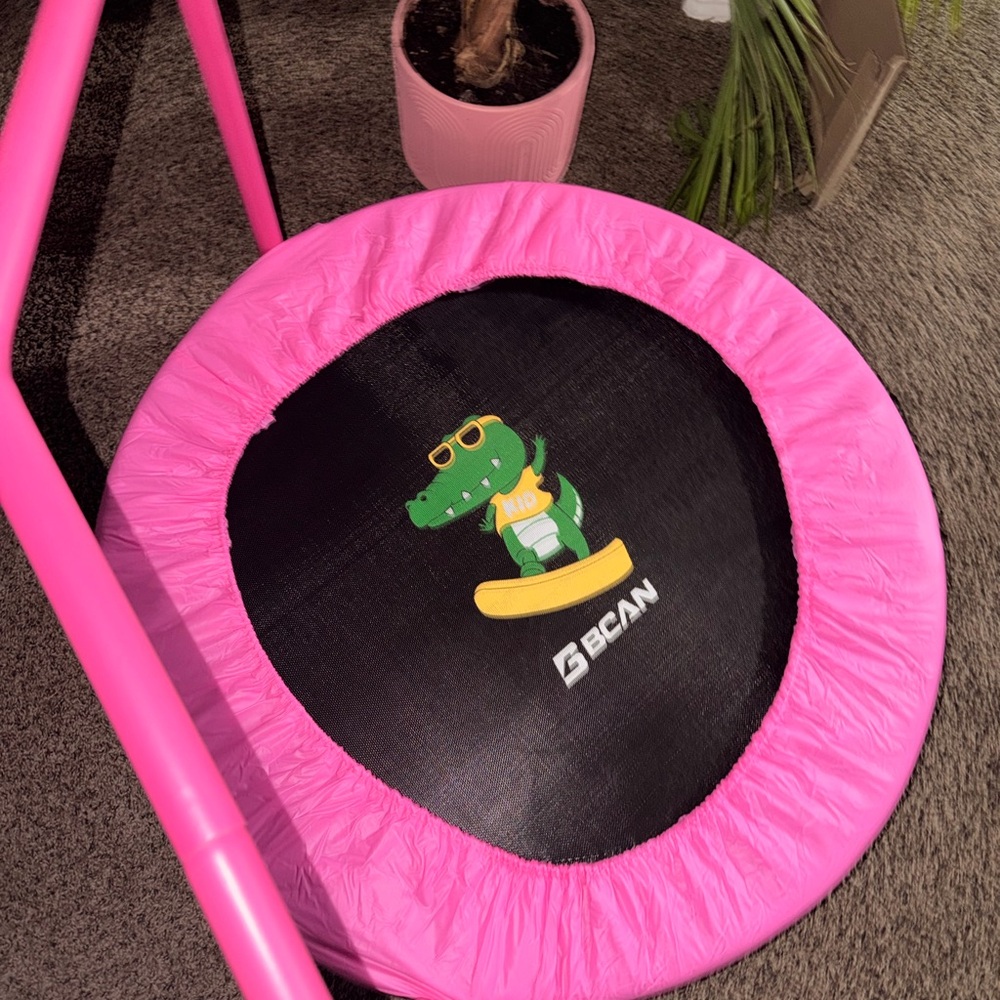 Pink Kids Trampoline with Fun Dinosaur Design
